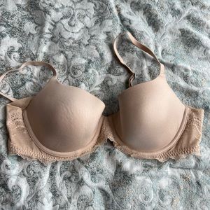 2 (identical) Spanx push up bras 36B